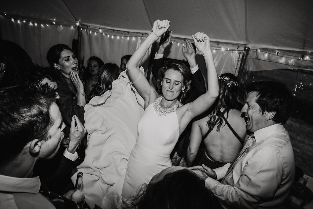 Rock and roll dancing bride at wedding party