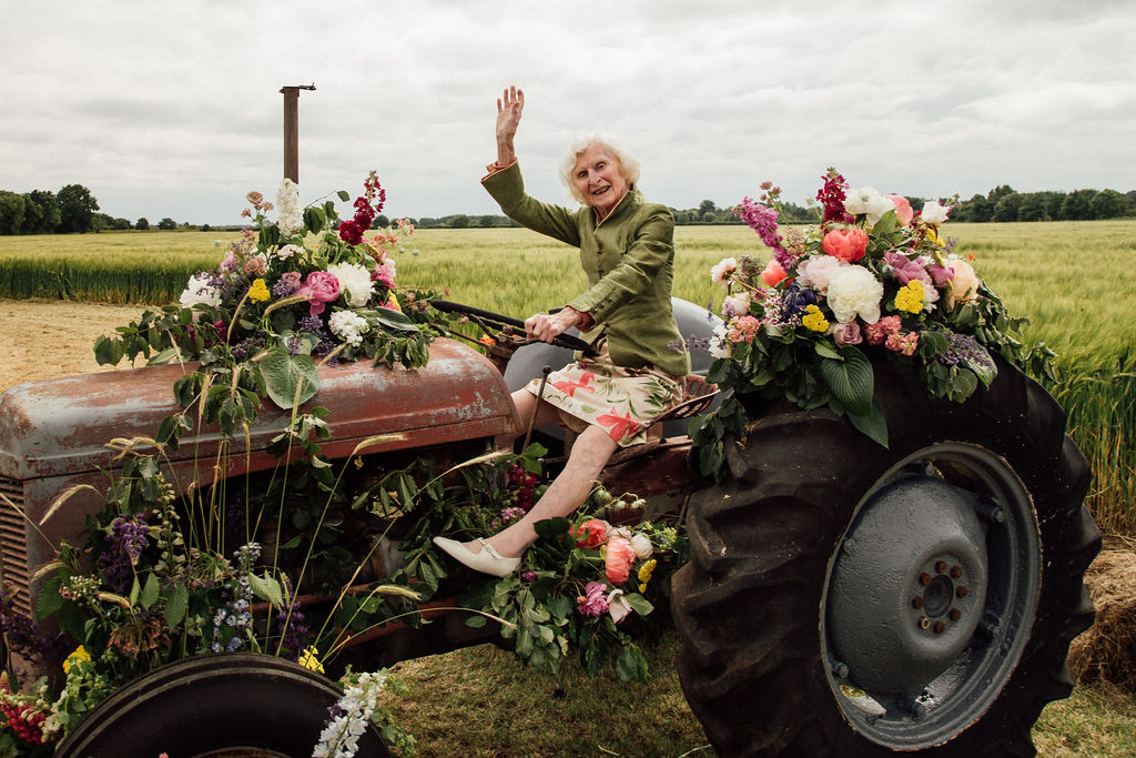 Floral vintage tractor with a vintage Granny